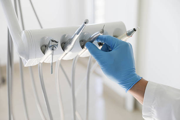 Professional Invisalign Clear Aligners technician working in Gloucester, MA